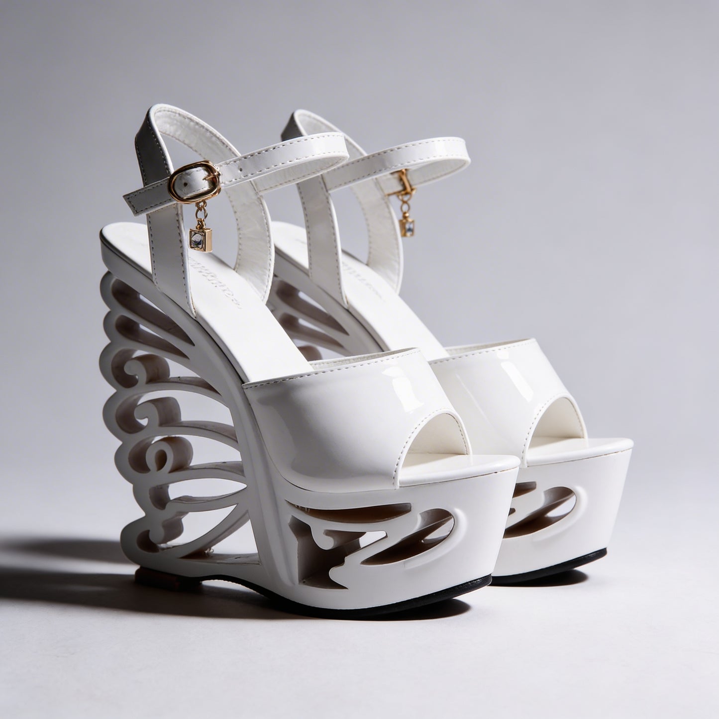 Orfeo Sculptural Wedge Sandals Collection