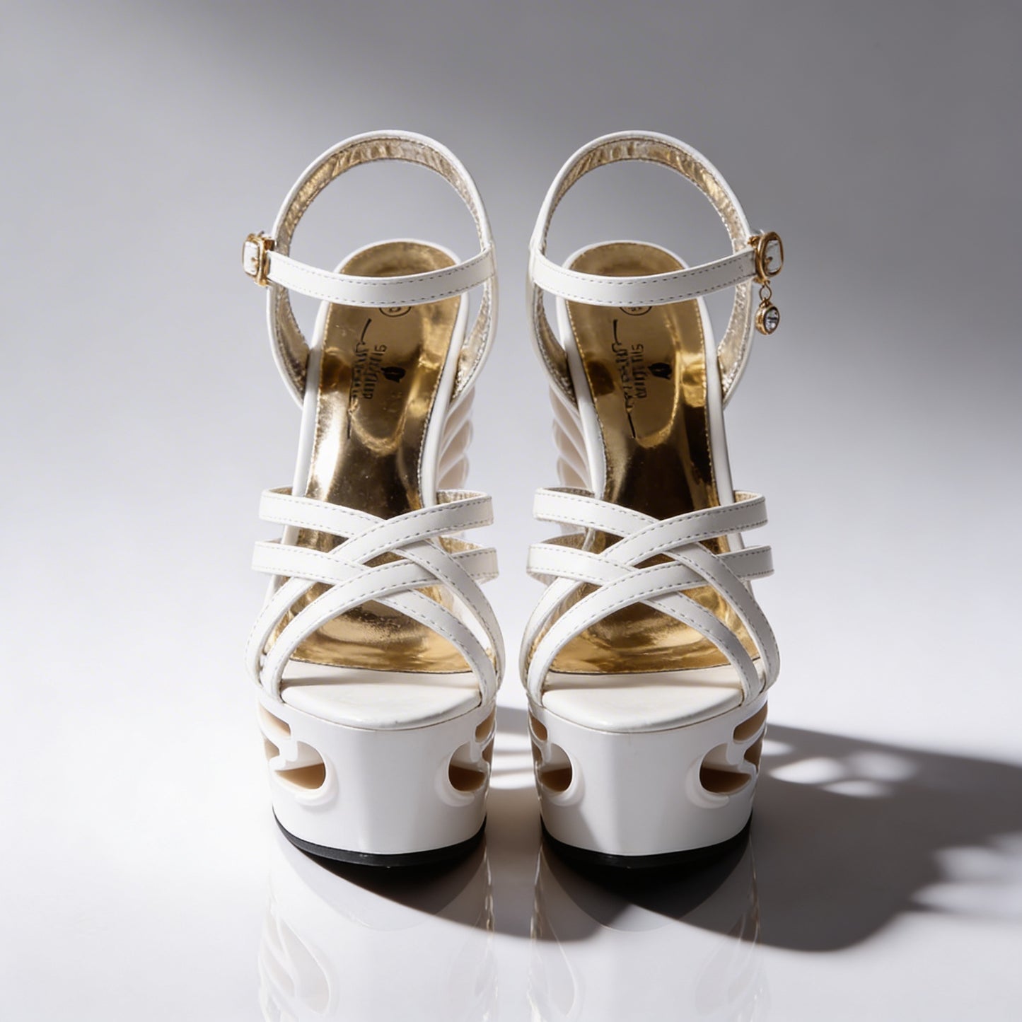 Orfeo Sculptural Wedge Sandals Collection