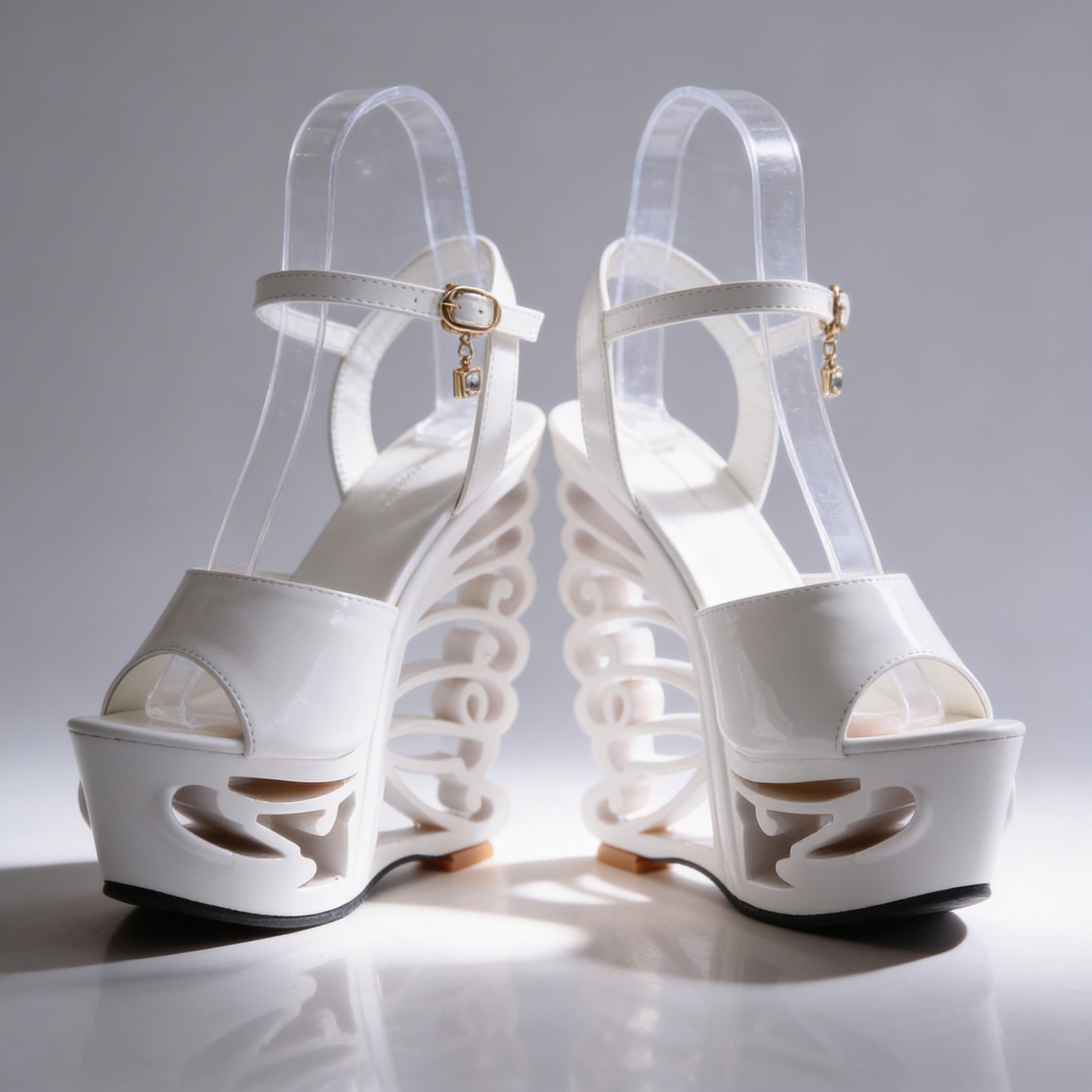 Orfeo Sculptural Wedge Sandals Collection