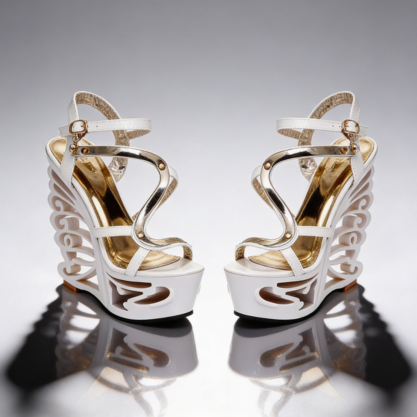 Orfeo Sculptural Wedge Sandals Collection