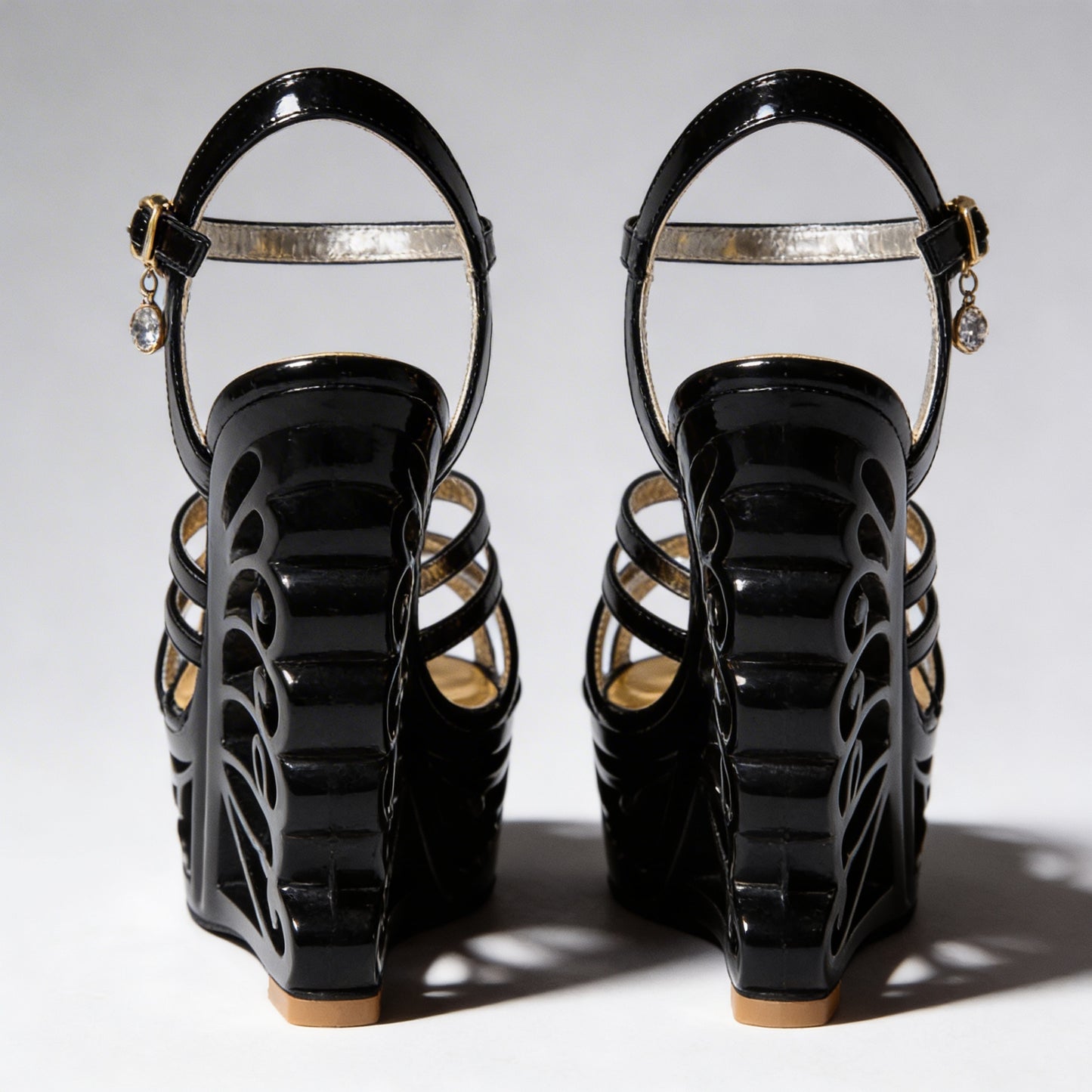 Orfeo Sculptural Wedge Sandals Collection